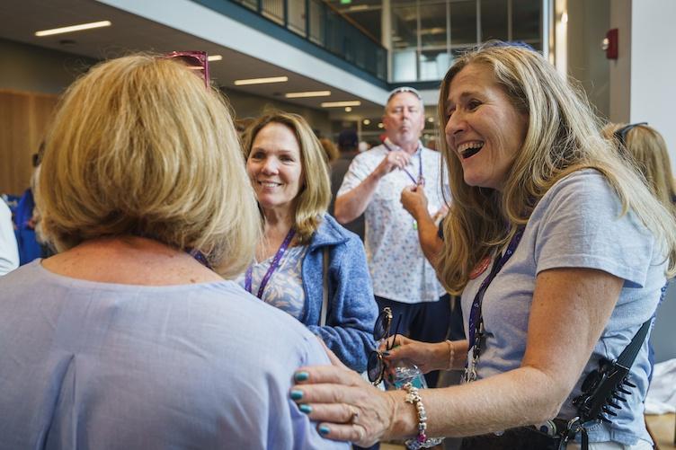 Women having conversation at reunion